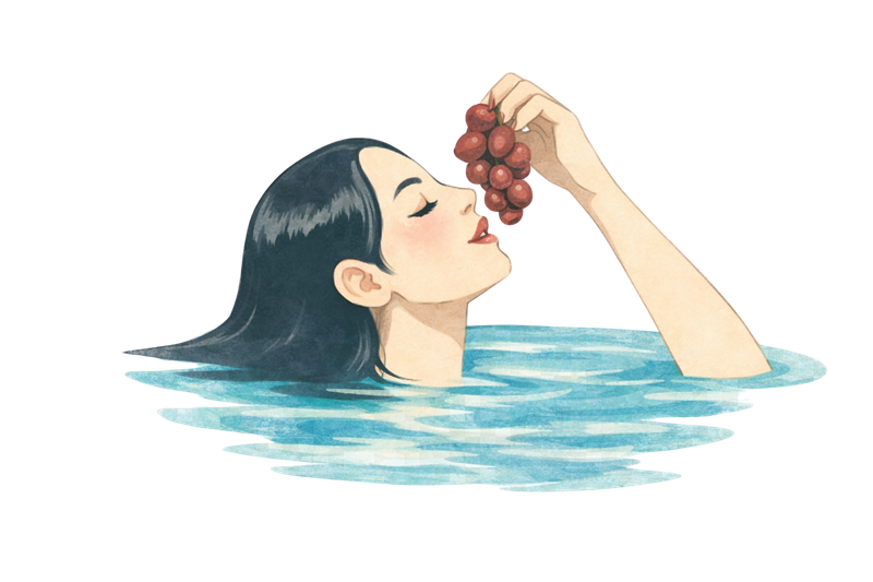 Woman eating grapes in pool